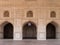 AGRA, INDIA - MARCH, 28, 2019: ornately carved ventilation screen above a archways at red fort