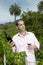 Agrarian man in a vineyard