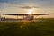 Agreement airplane parked in front of his hangar