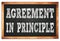 AGREEMENT IN PRINCIPLE words on black wooden frame school blackboard