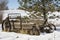 Agricultural antique manure spreader wooden snow winter