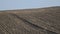 Agricultural background of newly plowed field