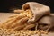 Agricultural beauty Close up of wheat in a small sack background