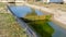 Agricultural canal or irrigation canal in a concrete wall Direct water to the farmer`s farmland in arid areas of risky farming