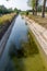 Agricultural canal or irrigation canal in a concrete wall Direct water to the farmer`s farmland in arid areas of risky farming