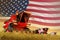 agricultural combine harvester working on wheat field with USA flag background, food production concept - industrial 3D