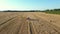 Agricultural Combine Machine Harvester Of Grain Crops On The Field Aerial View