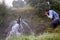 Agricultural equipment for field irrigation, an Indian farmer drinking water from water jet overflowing on his farm, Rain fog,