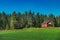 Agricultural green farm field, landscape in Norway