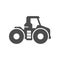 Agricultural heavy tractor glyph icon