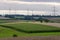 Agricultural machinery on the fields in the suburbs of the small town of Neustadt