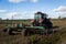 Agricultural machinery, prepares the land with a cultivator. Plowing a tractor