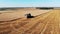 Agricultural machines are reaping crops