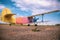 Agricultural plane is standing on a field