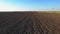 Agricultural plowed field ground soil