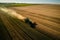 Agricultural Precision: Aerial View of a Tractor Tending to Crops. Generative By Ai