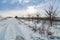 Agricultural road covered in snow