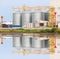 Agricultural Silo - Building Exterior, Storage and drying of grains, wheat, corn, soy, sunflower against the blue sky with