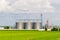 Agricultural Silo, foreground sunflower plantations - Building Exterior, Storage and drying of grains, wheat, corn, soy