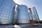 Agricultural Silos. Building Exterior. Storage and drying of grains, wheat, corn, soy, sunflower against the blue sky