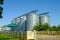 Agricultural Silos. Building for storage and drying of grain crops. Agribusiness concept