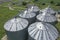 Agricultural silos on the farm, close-ups from above with a drone. Farm Industrial granary, elevator dryer, building exterior