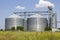 Agricultural Silos. Storage and drying. Storage of crop. Grain elevator. Metal grain elevator in agricultural zone. Agriculture
