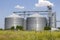 Agricultural Silos. Storage and drying. Storage of crop. Grain elevator. Metal grain elevator in agricultural zone. Agriculture