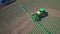 Agricultural sprayer irrigating on farming field. Fertilizer spreader