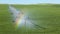 An agricultural sprinkler in an Idaho farm field.