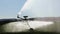 An agricultural sprinkler in an Idaho farm field.