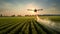 Agricultural technology concept. drone flies over green field and sprays useful pesticides to increase productivity destroys