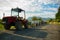 Agricultural tractor equipped with small wagons to make trips to children in the agrarian lands