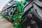 Agricultural tractors lined up in a row