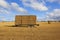 Agricultural trailer with straw bales at harvest time