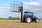 Agricultural traktor with hay bails