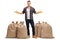 Agricultural worker standing between burlap sacks and gesturing