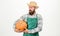 Agriculture concept. Farmer straw hat carry big pumpkin. Farming and agriculture. Man bearded rustic farmer wear apron