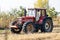 Agriculture concept. Tractor preparing for work on a field. Autumn season. Targoviste, Romania, 2019