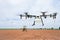 Agriculture drone flying on preparing land