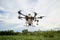Agriculture drones fly on corn fields