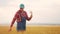 Agriculture. farmer working in the field holding spikelets of wheat. agriculture business farm concept. farmer man in