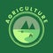 Agriculture and farming with a tractor with cultivator, logo design.