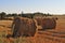 Agriculture field with straw rolls