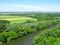 Agriculture, fields in wooded area, Morava river, top view