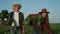 Agriculture. Group of farmers in walk on a green field with box teamwork. Business natural food agriculture concept