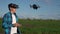 agriculture. man farmer a aerial pilot drone survey explorers green wheat crops in the field. agriculture modern