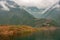 Agriculture and mountains under cloudscape along Daning River, Wuchan, China