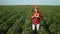 Agriculture. smart farming soybean a technology. Close-up of farmer sunset walk digital tablet walk on green field of