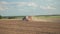 Agriculture tillage. Farm field with tractor. Cultivation of land and soil.